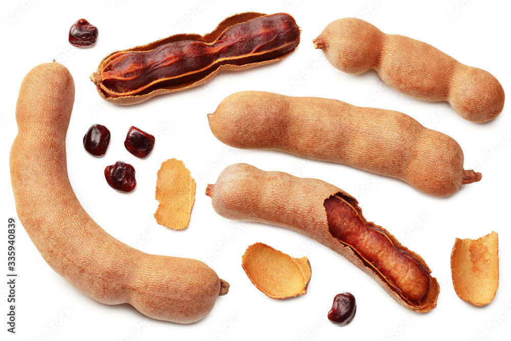 fresh tamarind fruits isolated on white background. top view fresh tamarind fruits isolated on white background. top view