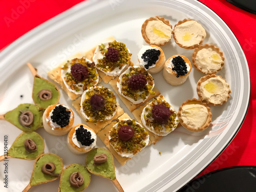 Caviar, anchovies and cheese appetizer with a perfect presentation. Only for discerning diners.