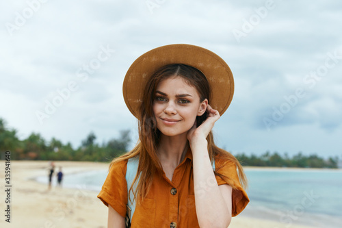 young woman in hat