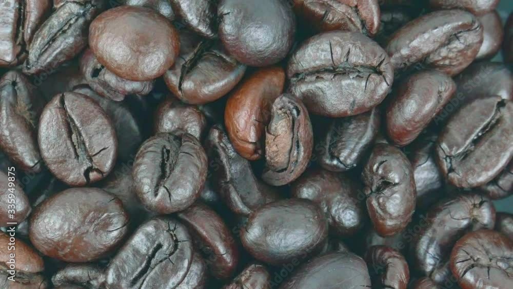 Close up coffee beans Move the camera slowly, Top view Food concept. Close up coffee beans Move the camera slowly, Top view Food concept.