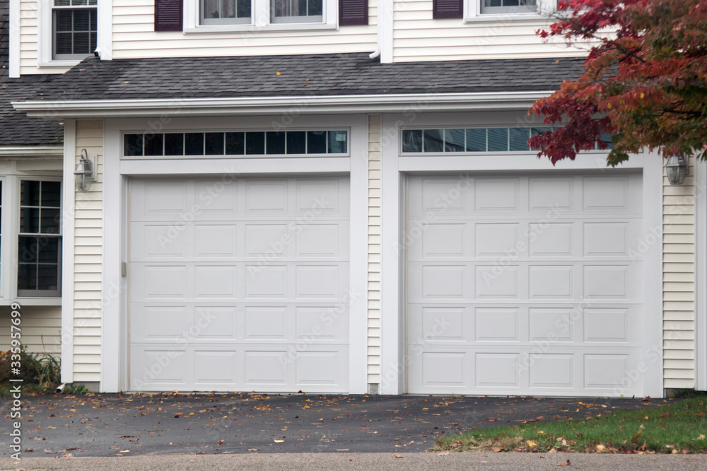 Two car Garage with doors painted in whie