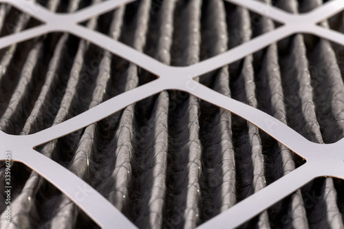 Close up of home air filter showing the dirt and particle cause bacteria inflection and sickness.