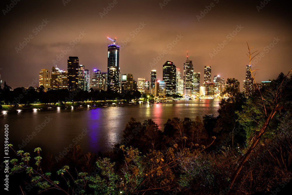 Fototapeta premium A City By The River with Beautiful Lights
