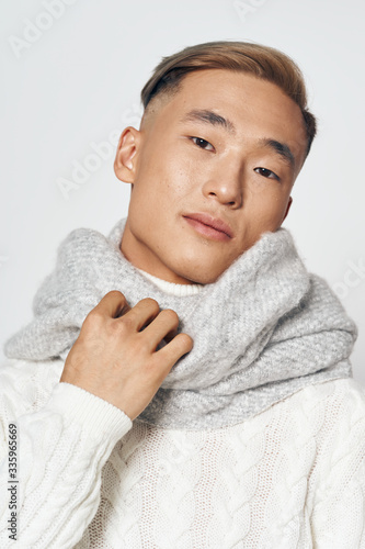 portrait of a young man with a towel