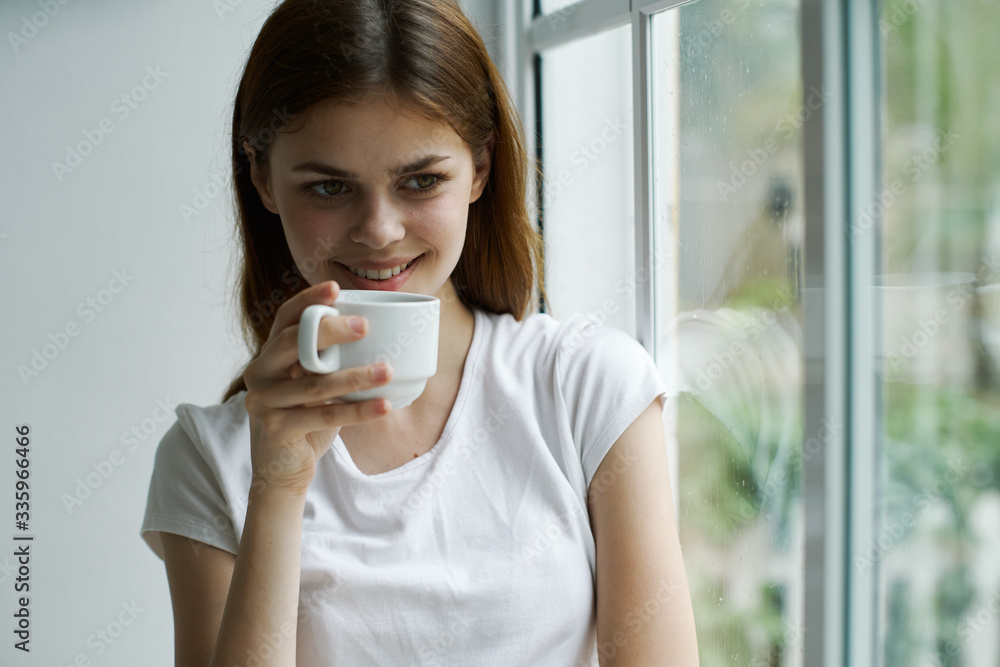 young woman drinking coffee young woman drinking coffee