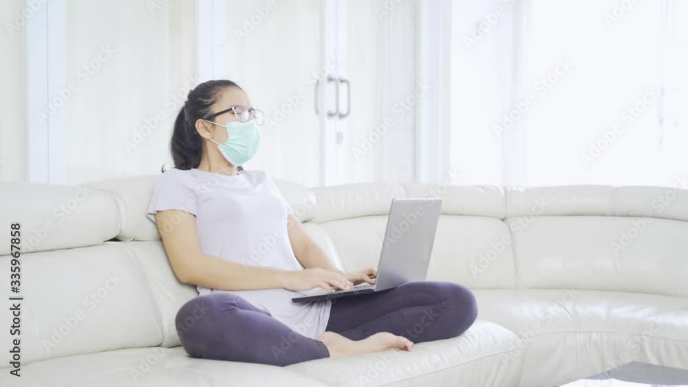 Asian woman having cough during work at home Asian woman having cough during work at home