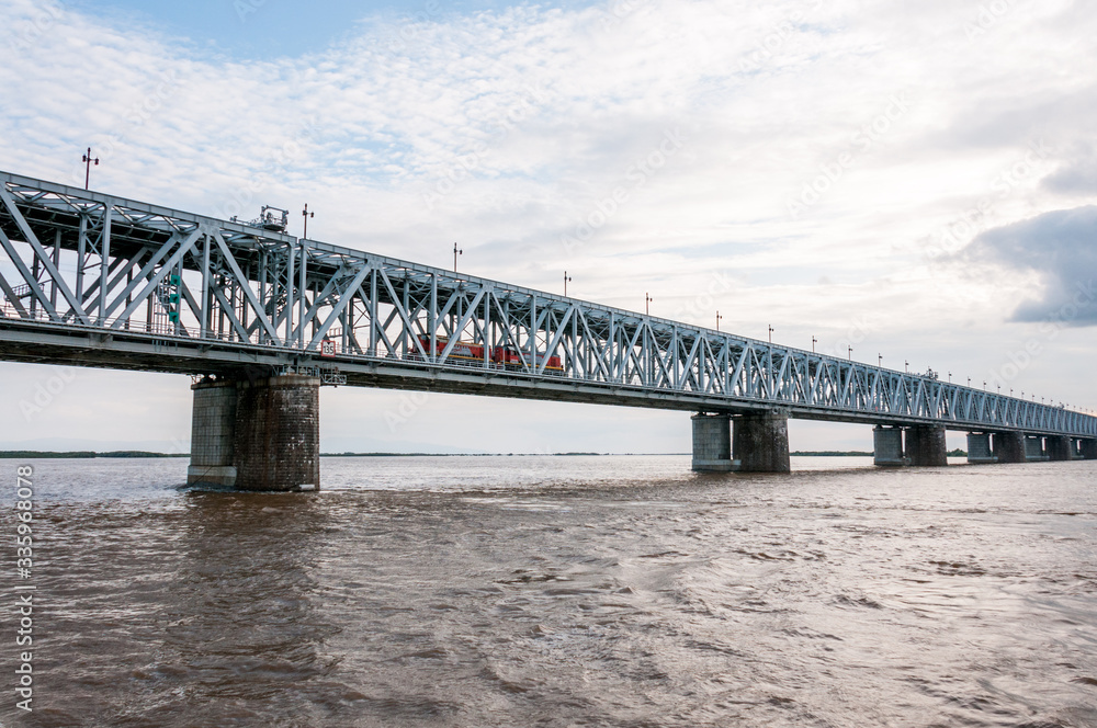 Russia, Khabarovsk, August 2019: Road bridge on the Amur river in the city of Khabarovsk in the summer