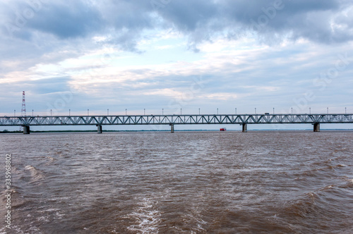 Russia, Khabarovsk, August 2019: Road bridge on the Amur river in the city of Khabarovsk in the summer