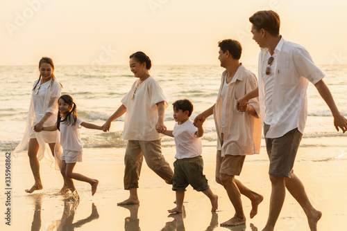 Lifestyle. Asian families on the beach. Travel, Vacations, Post Crisis Vacations
