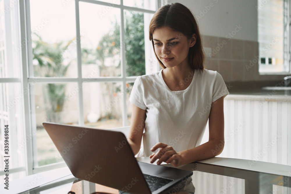 young woman working on laptop
