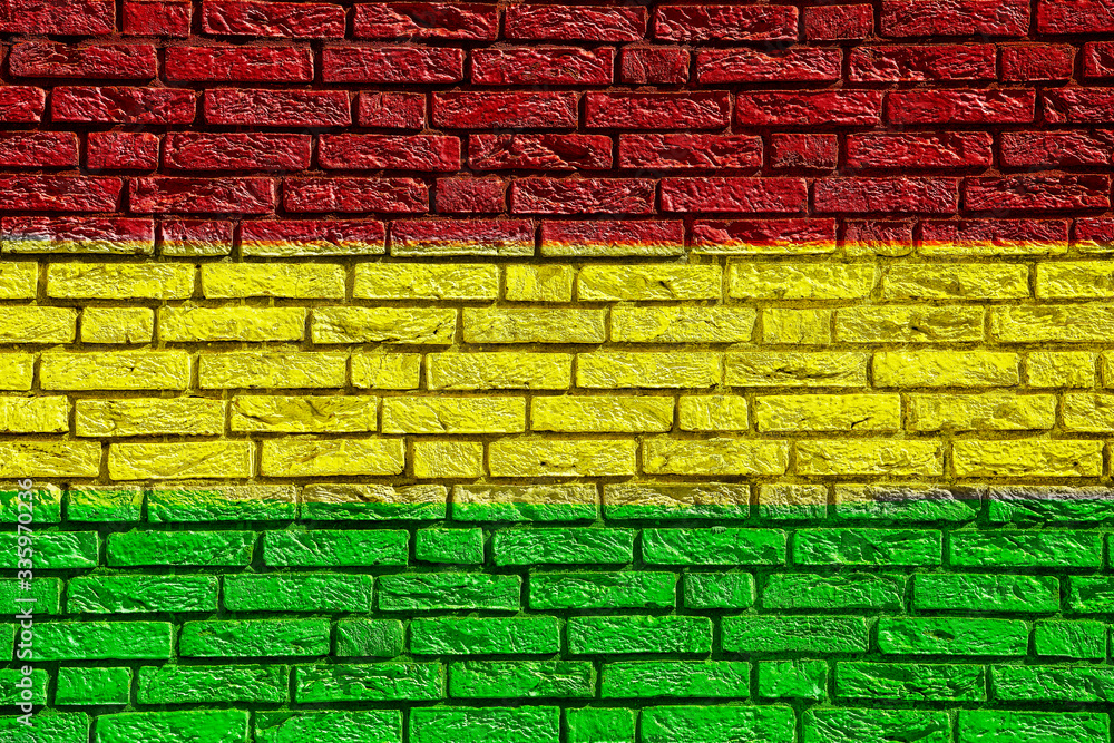 Colorful background and texture depiction of country flag on a brick wall. Colorful background and texture depiction of country flag on a brick wall.