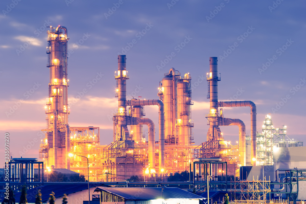 Fototapeta premium Oil gas refinery plant. May called petroleum, production or petrochemical plant. Industrial factory construction from engineering technology with steel pipe, pipeline, tank. Business for power energy.
