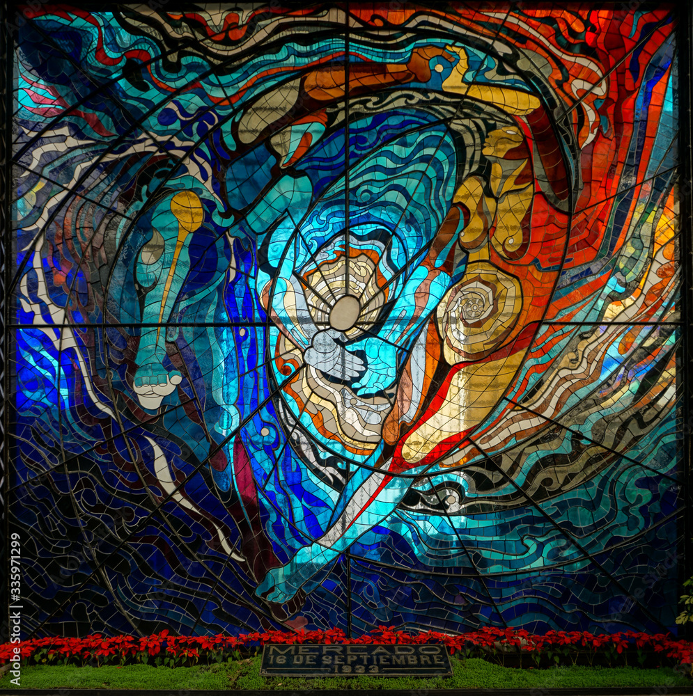 Fototapeta premium Vibrant colored circular stained glass