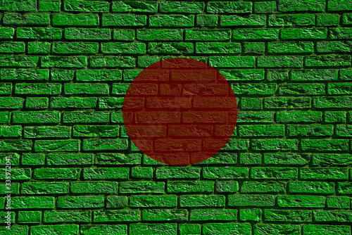 Colorful background and texture depiction of country flag on a brick wall.  photo