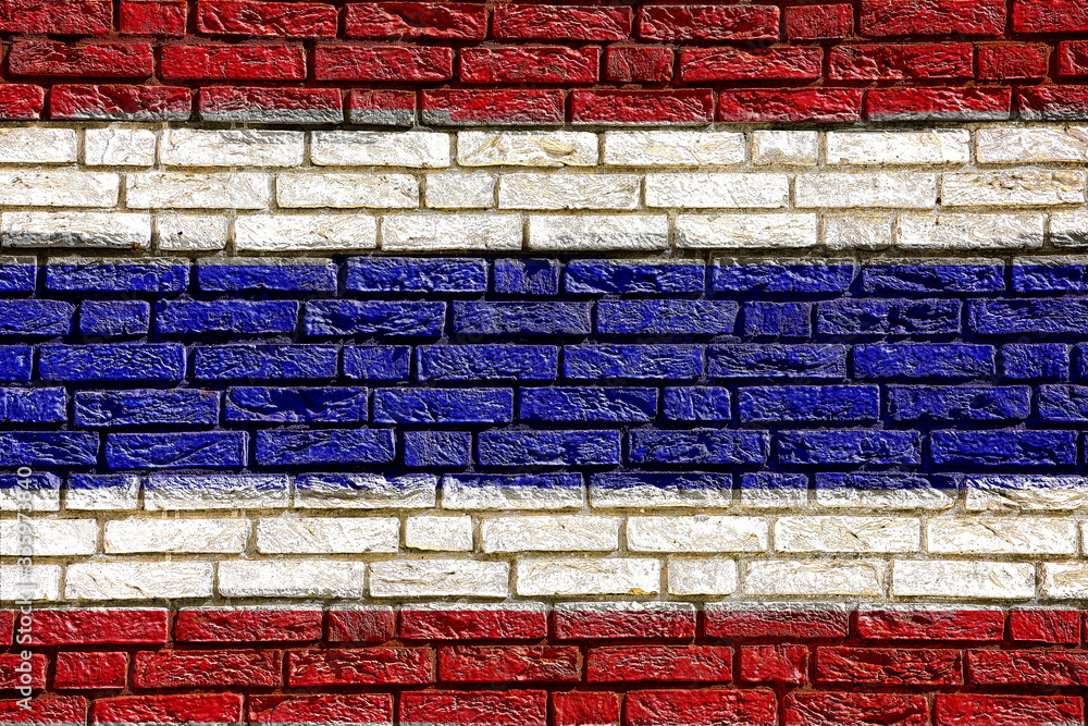 Colorful background and texture depiction of country flag on a brick wall. Colorful background and texture depiction of country flag on a brick wall.