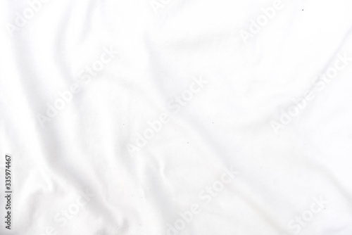 Abstract white fabric texture background. Wavy white cloth.