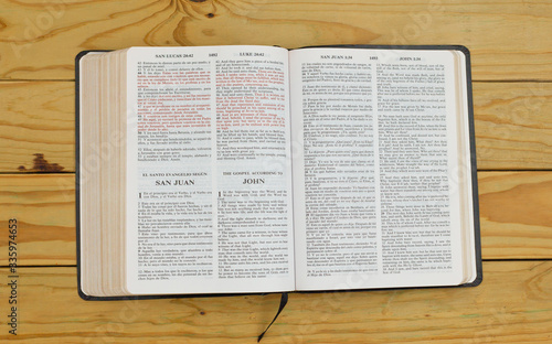 open bilingual bible book on John, Spanish and english 