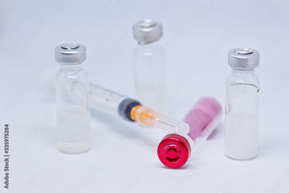syringe and vials of injectable drugs syringe and vials of injectable drugs