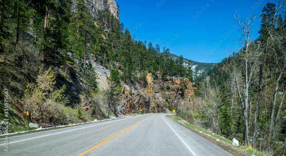 Fototapeta premium A long way down the road of Spearfish Canyon Scenic Byway, South Dakota