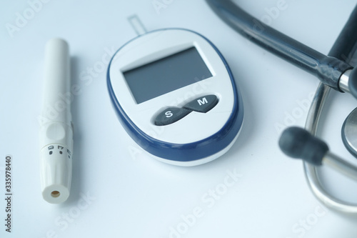  blood sugar measurement for diabetes and stethoscope on table 