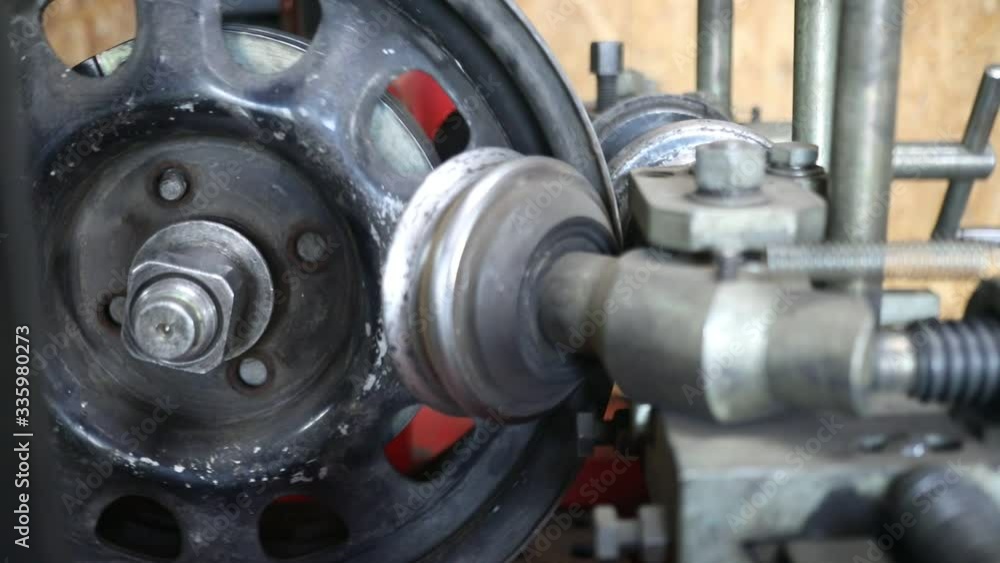Process of tire repairing. Repair a tire from car by mechanic. Winter tires Process of tire repairing. Repair a tire from car by mechanic. Winter tires
