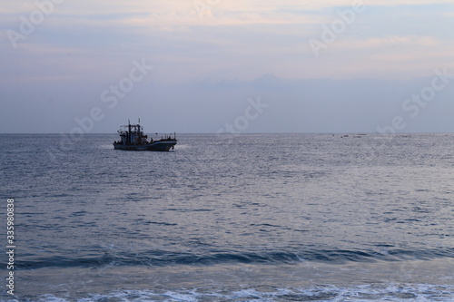 Long exposure sunrise seascape with Chinese fishing junks in the background © Jim