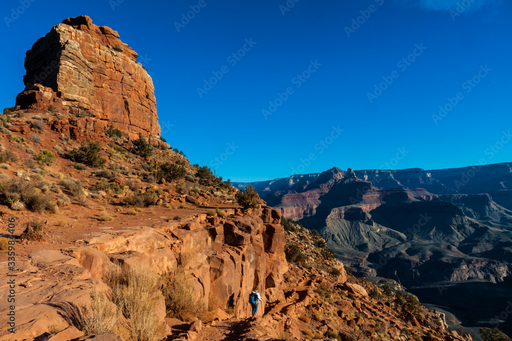 Female Hiker Desecending The South Kaibab Trail Near O'Neill Butte and Zoroaster Temple, South Kaibab Trail, Grand Canyon National Park, Arizona, USA