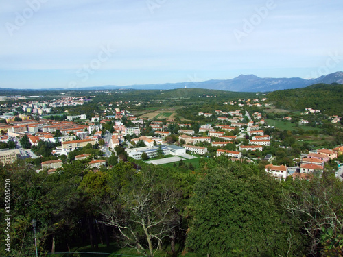 Panorama of the newer part of the town from the lookout on the old town of Labin - Istria, Croatia (Panorama na noviji dio gradskog naselja sa vidikovca na starom gradu Labinu - Istra, Hrvatska) photo