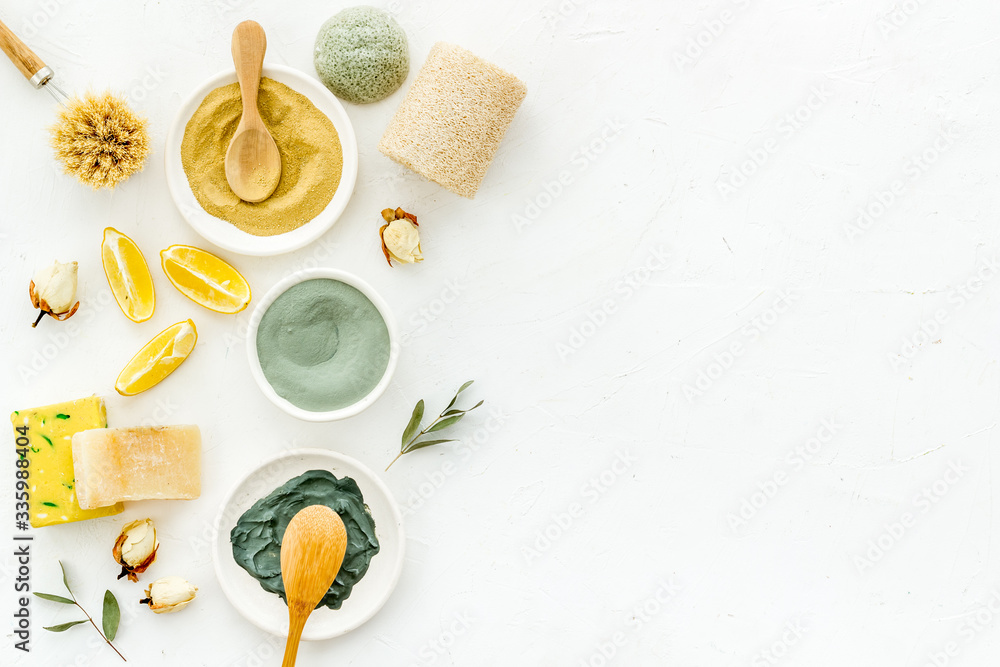 Clay mask in bowl for facial spa on white background top view copy space Clay mask in bowl for facial spa on white background top view copy space