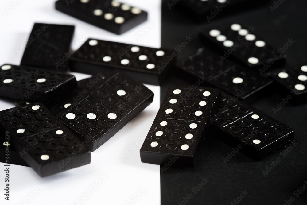 Domino blocks for mind game on a black and whit background Domino blocks for mind game on a black and whit background