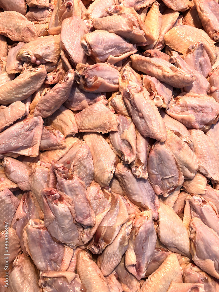 Photo of fresh chicken on the counter supermarket