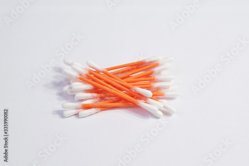 Cotton swabs heap on a white background