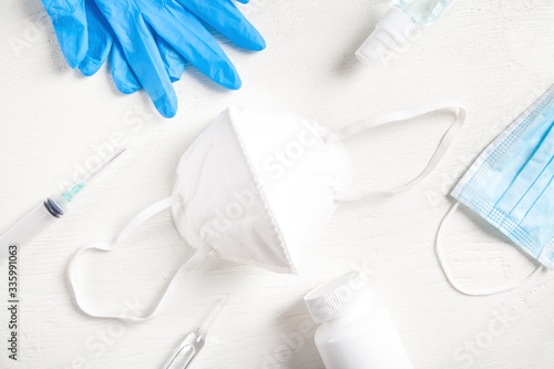 Sanitizer gel  face mask  gloves  syringe. Coronavirus Disease Prevention
