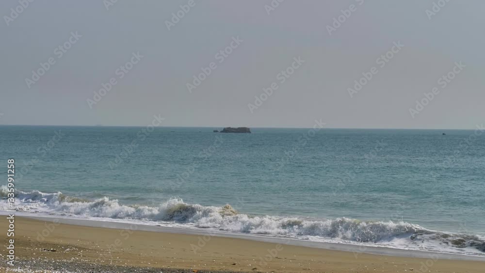 The waves splashing on the shore of the Pacific Ocean in Japan The waves splashing on the shore of the Pacific Ocean in Japan