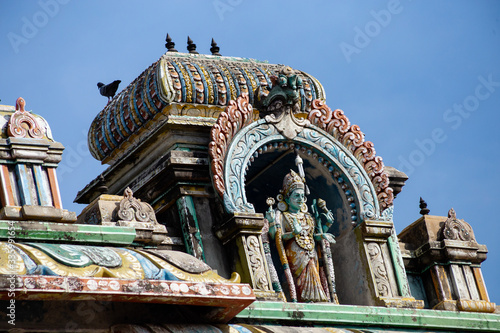 Hindu temple in Tamil Nadu, South India. Sculptures on Hindu temple gopura (tower), sculpture of an Indian deity