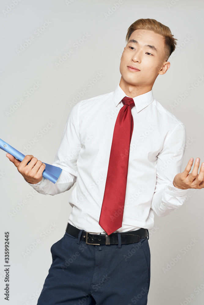 business man in suit holding a credit card business man in suit holding a credit card