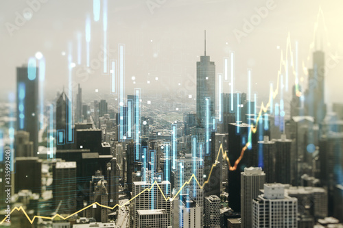 Multi exposure of abstract virtual financial graph hologram on Chicago skyline background  forex and investment concept