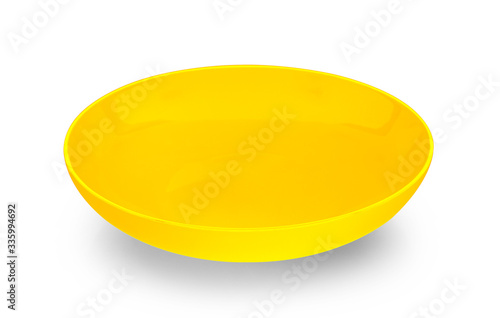 yellow plate isolated on white.