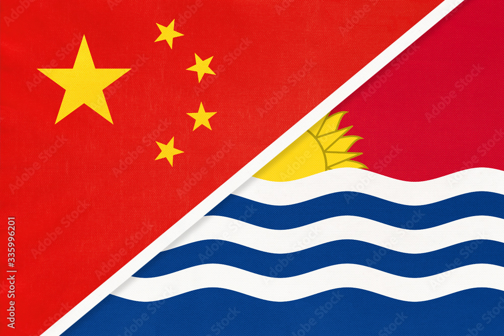 China or PRC vs Kiribati national flag from textile. Relationship between Asian and Oceania countries. China or PRC vs Kiribati national flag from textile. Relationship between Asian and Oceania countries.