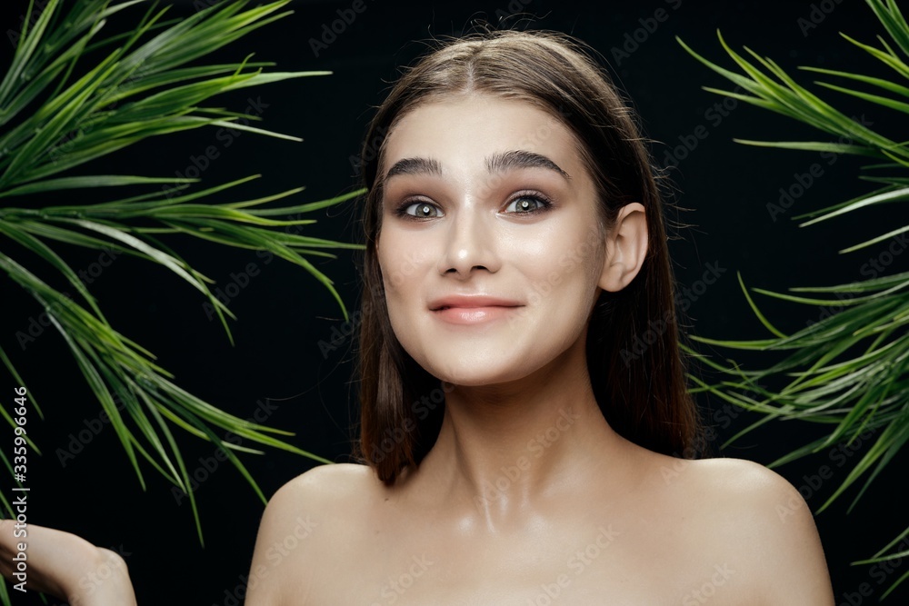 Fototapeta premium beautiful woman green leaves nature rest
