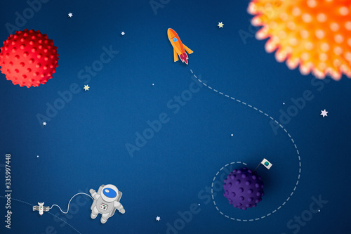 Fototapeta Naklejka Na Ścianę i Meble -  blue background with astronaut, stars and rocket