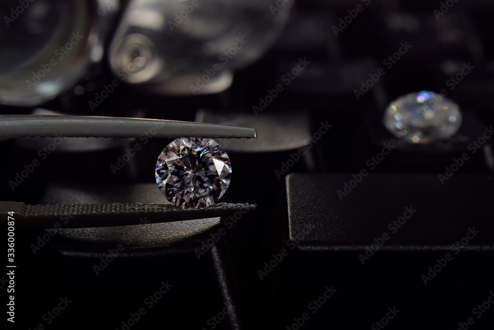 Selected diamonds In the gemstone clamp for making jewelry Selected diamonds In the gemstone clamp for making jewelry