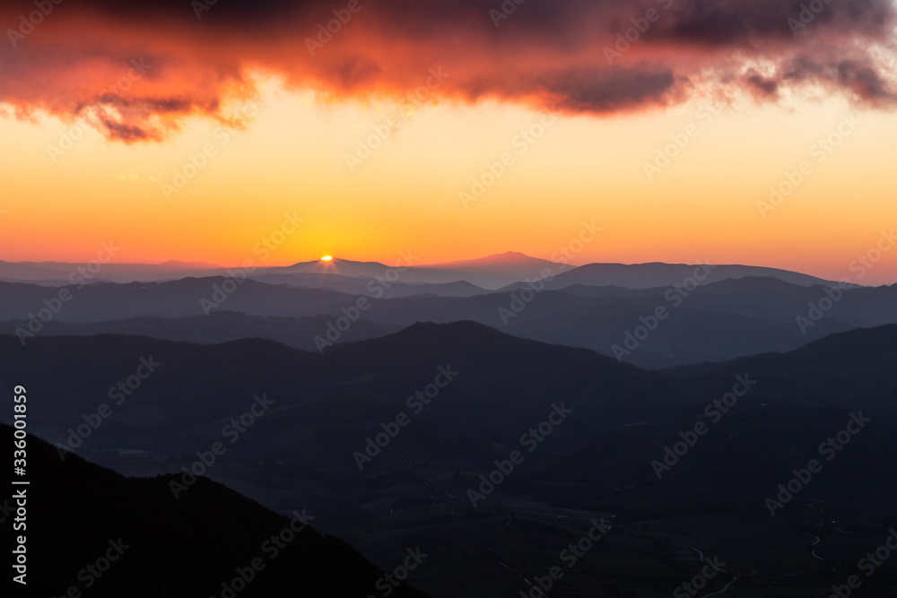 Sunset over mountains and valley
