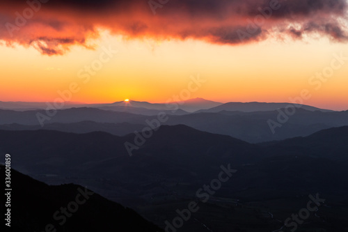 Sunset over mountains and valley