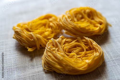 Italian uncooked dry pasta Tagliatelle