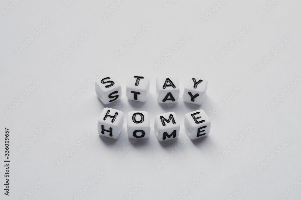 Stay Home written with word cubes, Stop Corona Virus, Mock up with no people and space for Text
Stay Home written with word cubes, Stop Corona Virus, Mock up with no people and space for Text