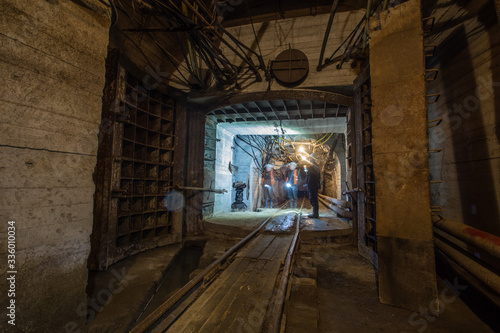 Underground magnesite ore mine tunnel with waterproof gates