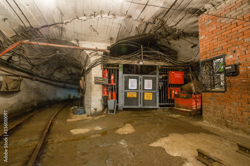 Shaft bottom lodge cage with light in underground mine