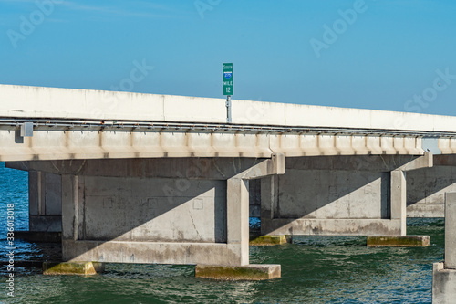 Bridge deck and pylons with road sign