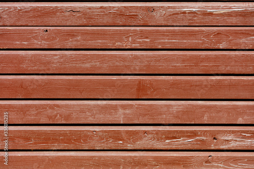 Texture and background of brown painted old horizontal wooden battens.